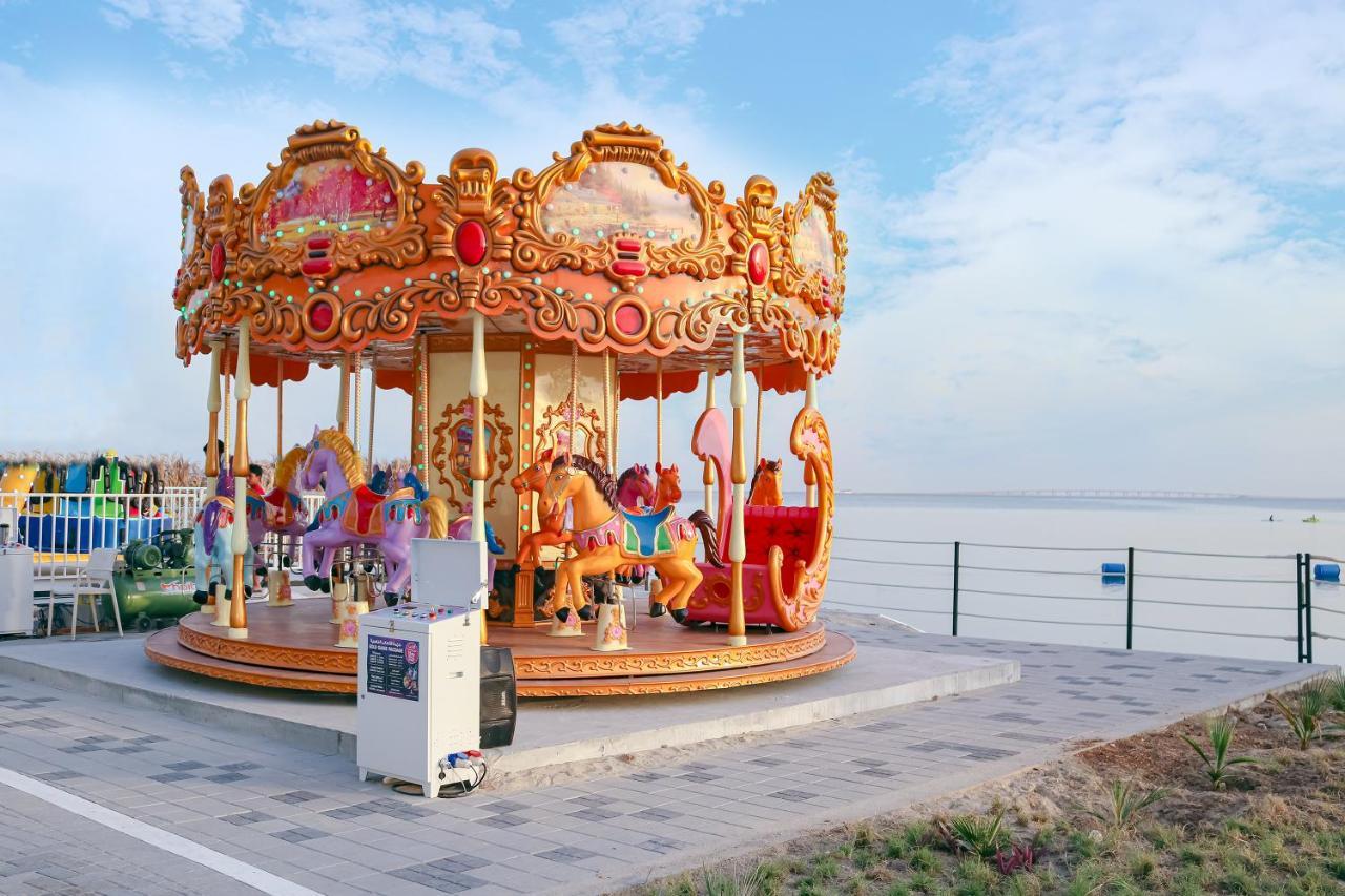 Lagoona Beach Luxury Resort And Spa Manama Exteriör bild A carousel in Pattaya, Thailand